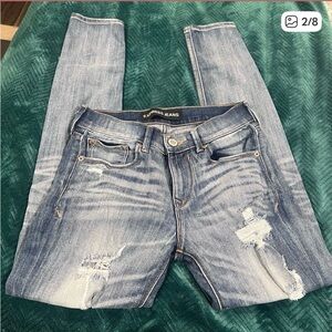 EUC Women’s Express 0 Light Wash Mid-rise Skinny Distressed Jeans